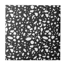 白いモダン装飾を施した黒いセラミックタイル