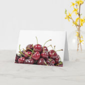 白い上に熟した赤いさくらんぼの山 カード (黄色い花)