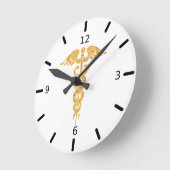 白い丸い時計の上のゴールドの杖 ラウンド壁時計 (傾斜)