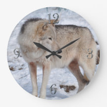 白い北極オオカミおよび雪の野性生物の芸術の時計
