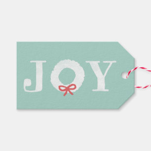 白い喜びのクリスマスのリースのクリスマスのプレゼントのラベル ギフトタグ