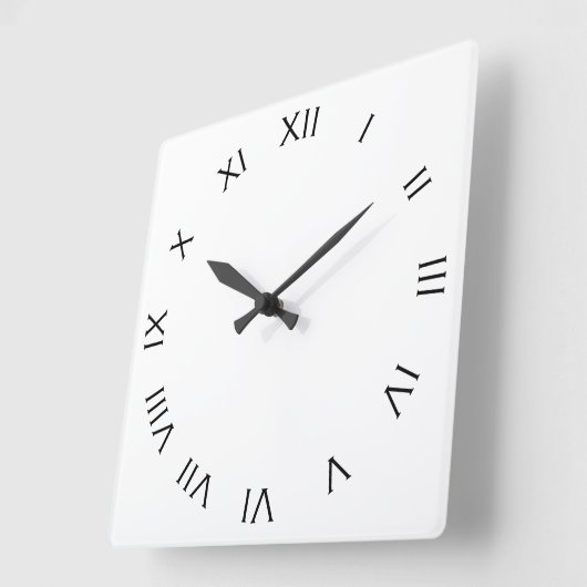 白い壁の時計の弧上の黒いローマ数字 スクエア壁時計 (傾斜)