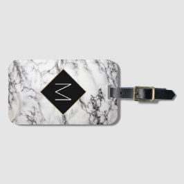 白い大理石のフェイク上に黒のモノグラム ラゲッジタグ