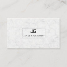 白い大理石のブロックのモノグラムの黒の開いたフレーム