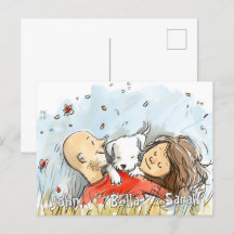 白い子犬とカップル