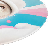 白い帽子をかぶったふわふわの犬 カッティングボード (角)