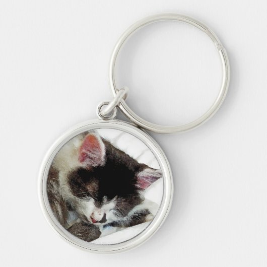 白い慰める人で眠った子ネコ キーホルダー (正面)