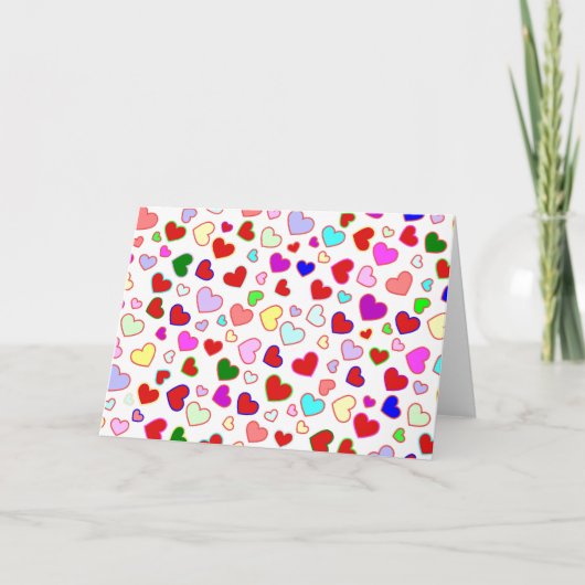 白い挨拶状のハートのカラフルな数々の カード (正面)