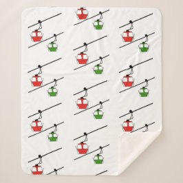 白い毛布の上に赤と緑のゴンドラ シェルパブランケット