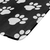 白い犬の猫の足跡を黒に カッティングボード (角)