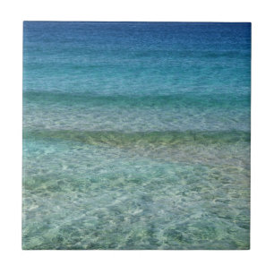 白い砂上の青い海水 タイル