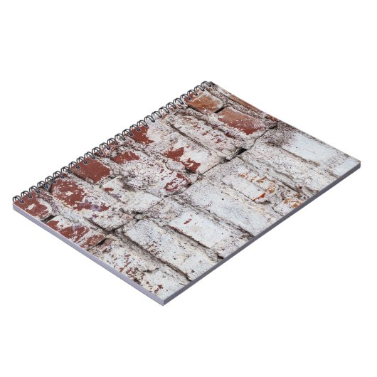 白い絵を描画質を剥がす古いレンガの壁 ノートブック (左側)