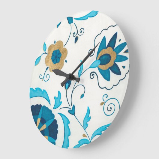 白い背景が付いている金めっきされたインディゴの花 ラージ壁時計 (傾斜)