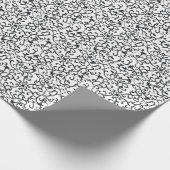 白い背景に可愛らしい黒い花の柄 ラッピングペーパー (角)