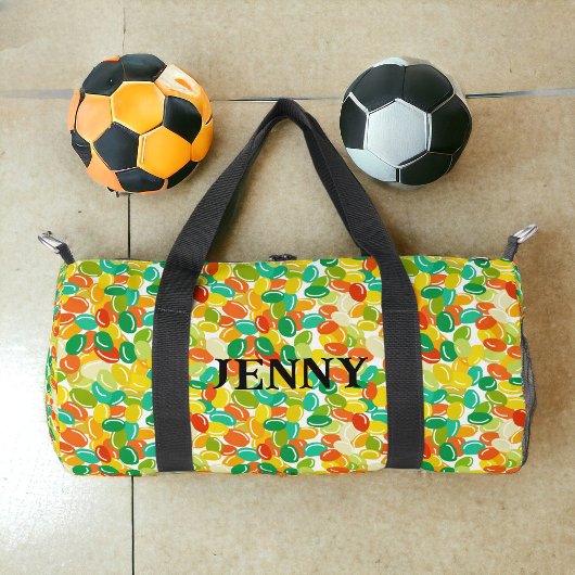 白い背景に数々のキャンディービーンズ黄色の色 ダッフルバッグ