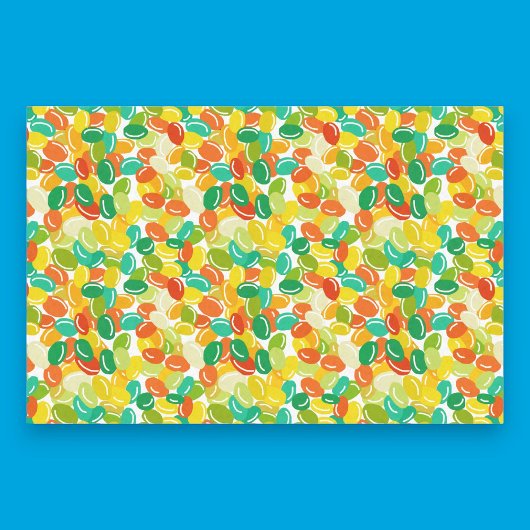 白い背景に数々のキャンディービーンズ黄色の色 薄葉紙