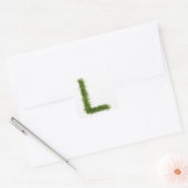 白い背景に文字「L」が入っている スクエアシール (封筒)