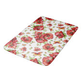 白い背景に緑の葉を持つ赤いケシ バスマット (アングル)