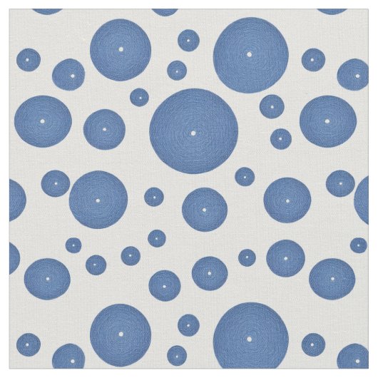 白い背景に青いニットの円 ファブリック (クローズアップ)