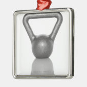 白い背景のやかんの鐘の切り取られる メタルオーナメント (左)