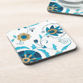 白い背景を持つ金箔の藍の花 コースター (左側)