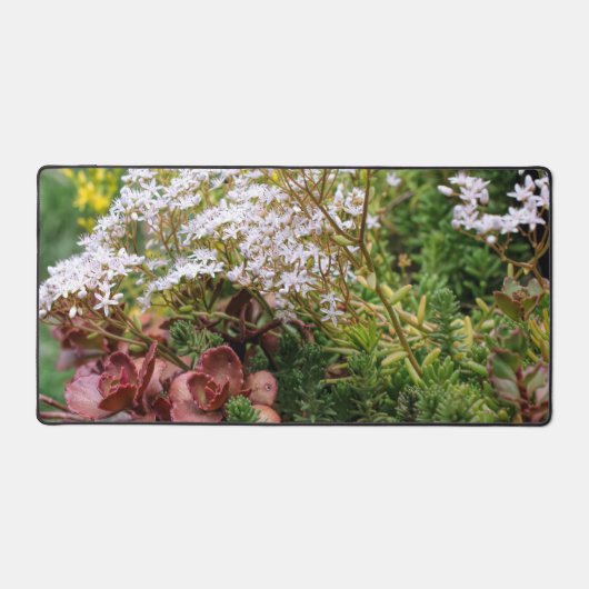 白い花が咲く半汁多汁 デスクマット (正面)