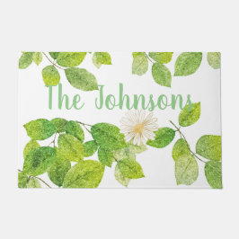 白い花と緑の葉 ドアマット