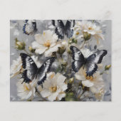 白い花の上に黒と白の蝶 (正面)