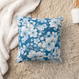 白い花模様、青い背景 クッション
