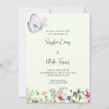 白い蝶と野の花の緑結婚の