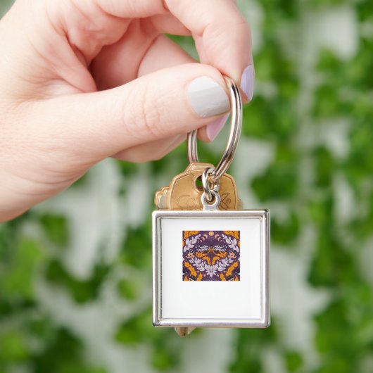 白い蝶の花模様 – 紫、ラベンダーアン キーホルダー (手)