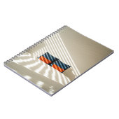 白い赤と白ベッドの上の黒い格子織物 ノートブック (左側)