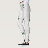 白い雪とクリスマスリボンのパターン レギンス (左)