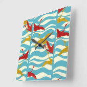 白い青飛んでいるい海の波の上の赤い黄色い鶴 スクエア壁時計 (傾斜)