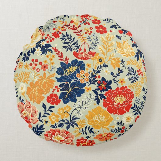 白い鮮やかフローラ赤、黄、青 ラウンドクッション (正面)