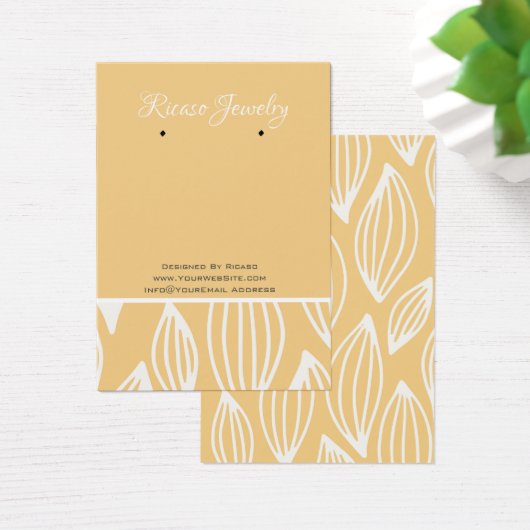 白い黄色の葉のパターンのイヤリングの背景 (デスク)