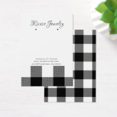 白い黒い格子状のイヤリングの背景 (デスク)