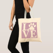 白いLOVEワードの犬の足型柄　すみれ色の背景 トートバッグ (正面(商品))