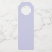 白うさぎオレンジ色の花に座ってライトブルー ボトルネックタグ (裏面)