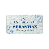 白くしわになったテクスチャシェフ名ベーカリーショップのロゴ ラベル (正面)