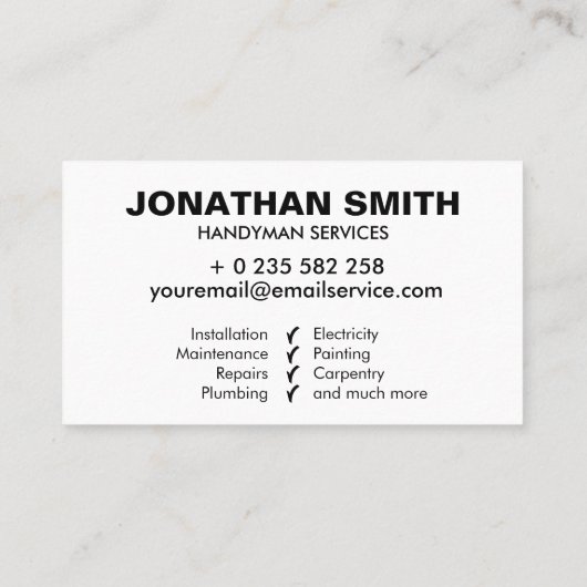 白とアイコン絵を描を扱う 名刺 (裏面)