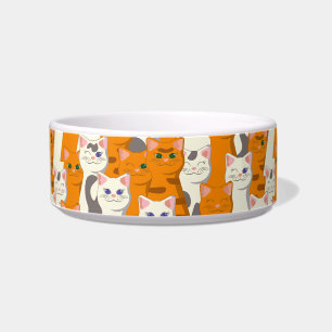 白とオレンジ色の猫が緑の目と青い目をパターン ボウル