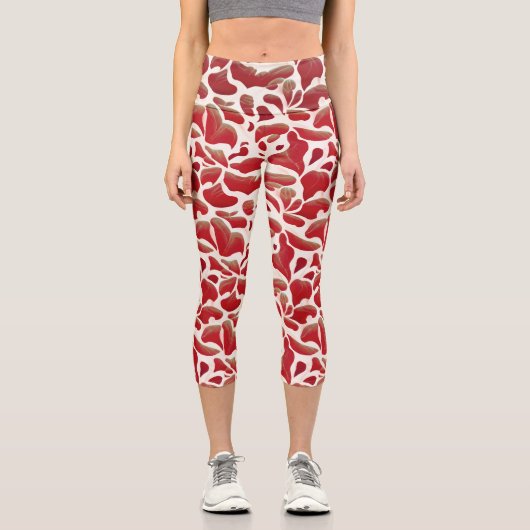 白と赤の飛んでいる葉の繰り返しパターン カプリレギンス (正面)