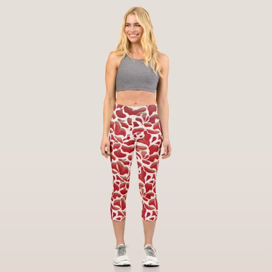 白と赤の飛んでいる葉の繰り返しパターン カプリレギンス