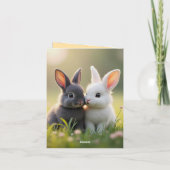 白と黒の可愛いベビーが草原に寝ている。 シーズンカード (裏面)