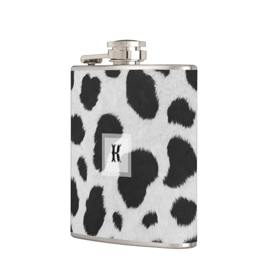 白と黒の牛の斑点のパターフェイクンのファーテクスチャ フラスク (左)