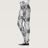 白と黒の透かし模様Anna レギンス (左)