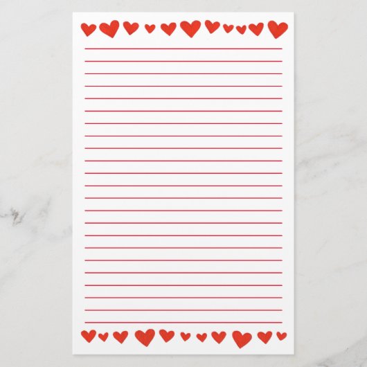 白によって並べられる文房具の赤いハート 便箋 (正面)