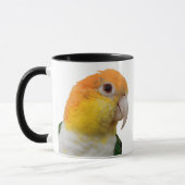 白によって膨らまされるシロハラインコのマグ マグカップ (左)