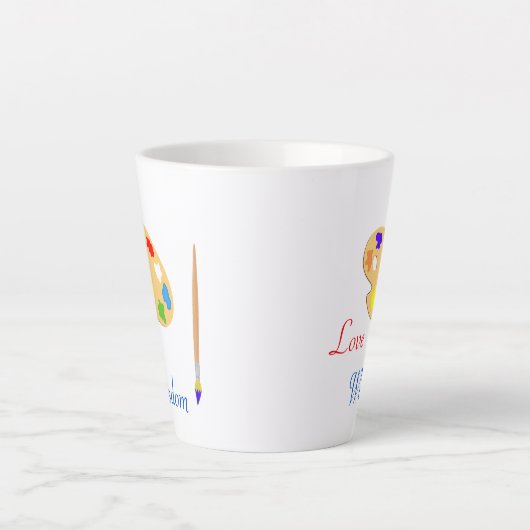 白にブラシと絵を描文字を付けたアートパレット カフェラテマグ (正面)